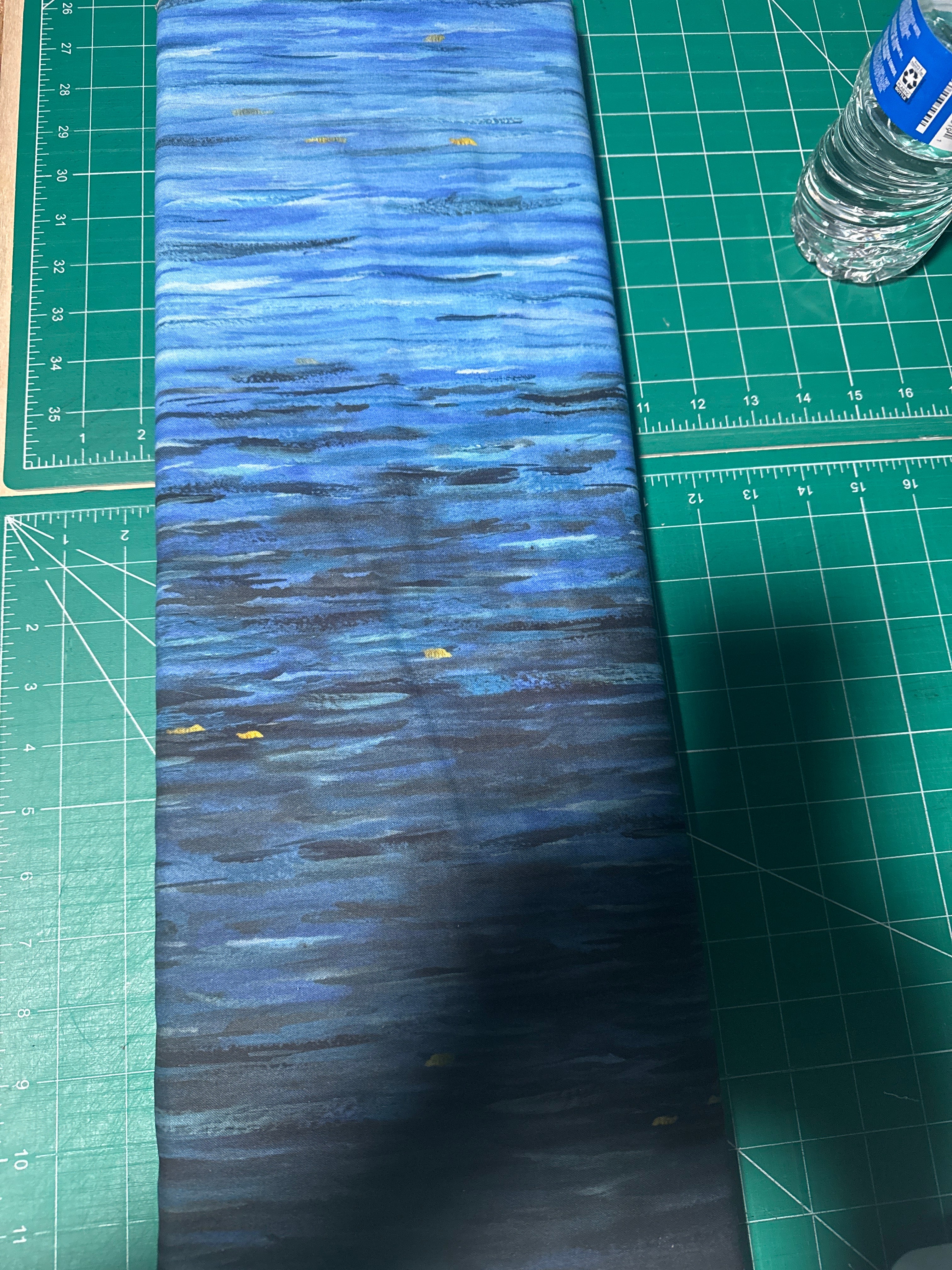 Behind Blue Eyes. Water. Sold by the half yard.