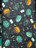 Witchy wicked cauldrons on a black background. Sold by the half yard.