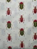 Bird Humbug. Bettles on a cream background. Sold by the half yard.