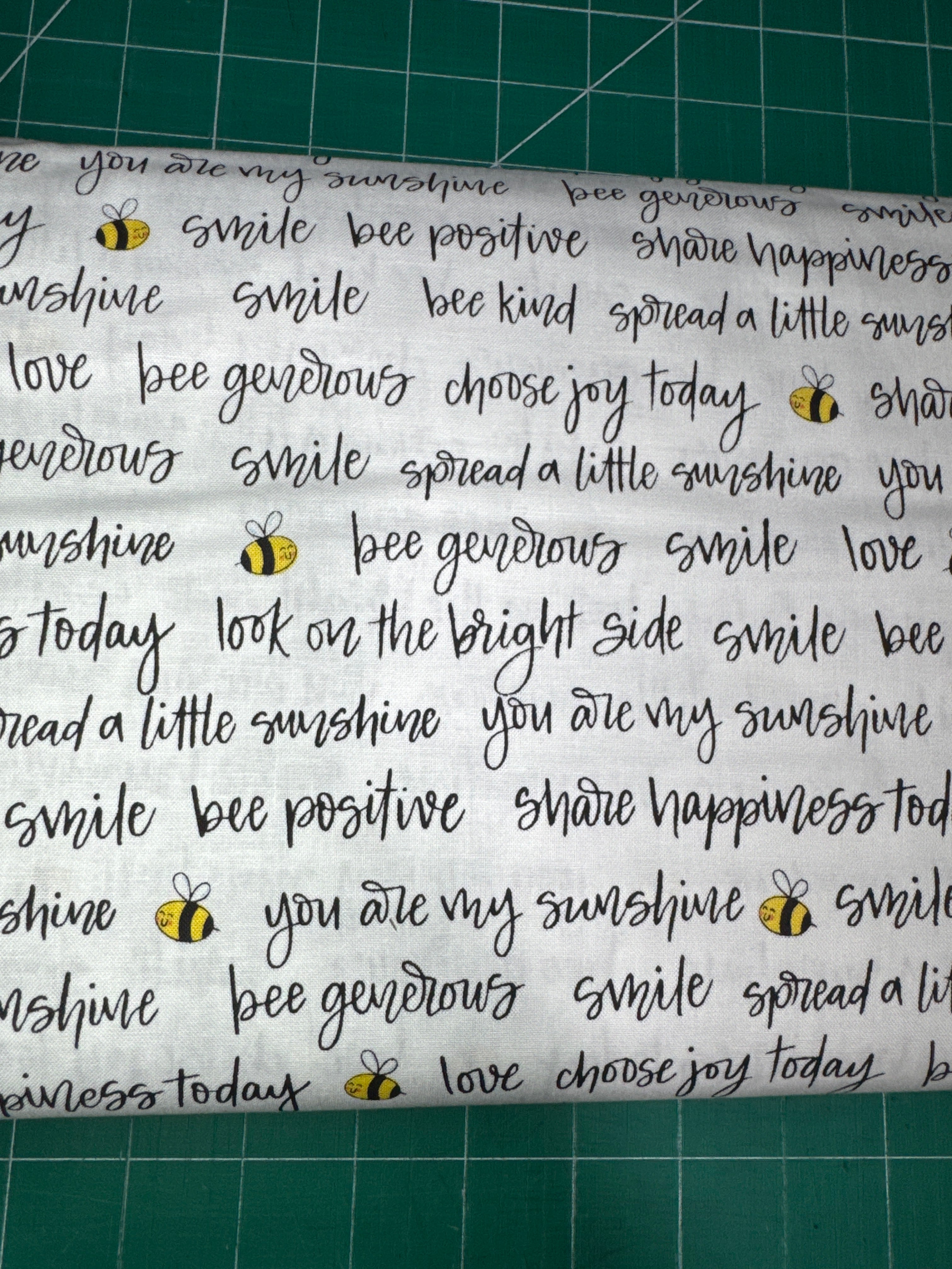 Bee kind. Sold by the half yard