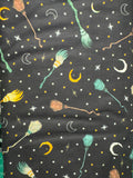 Witchy wicked brooms on a back black ground. Sold by the half yard.