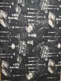Darkly Enchanted. Crows, books, candelabras. Sold by the half yard.