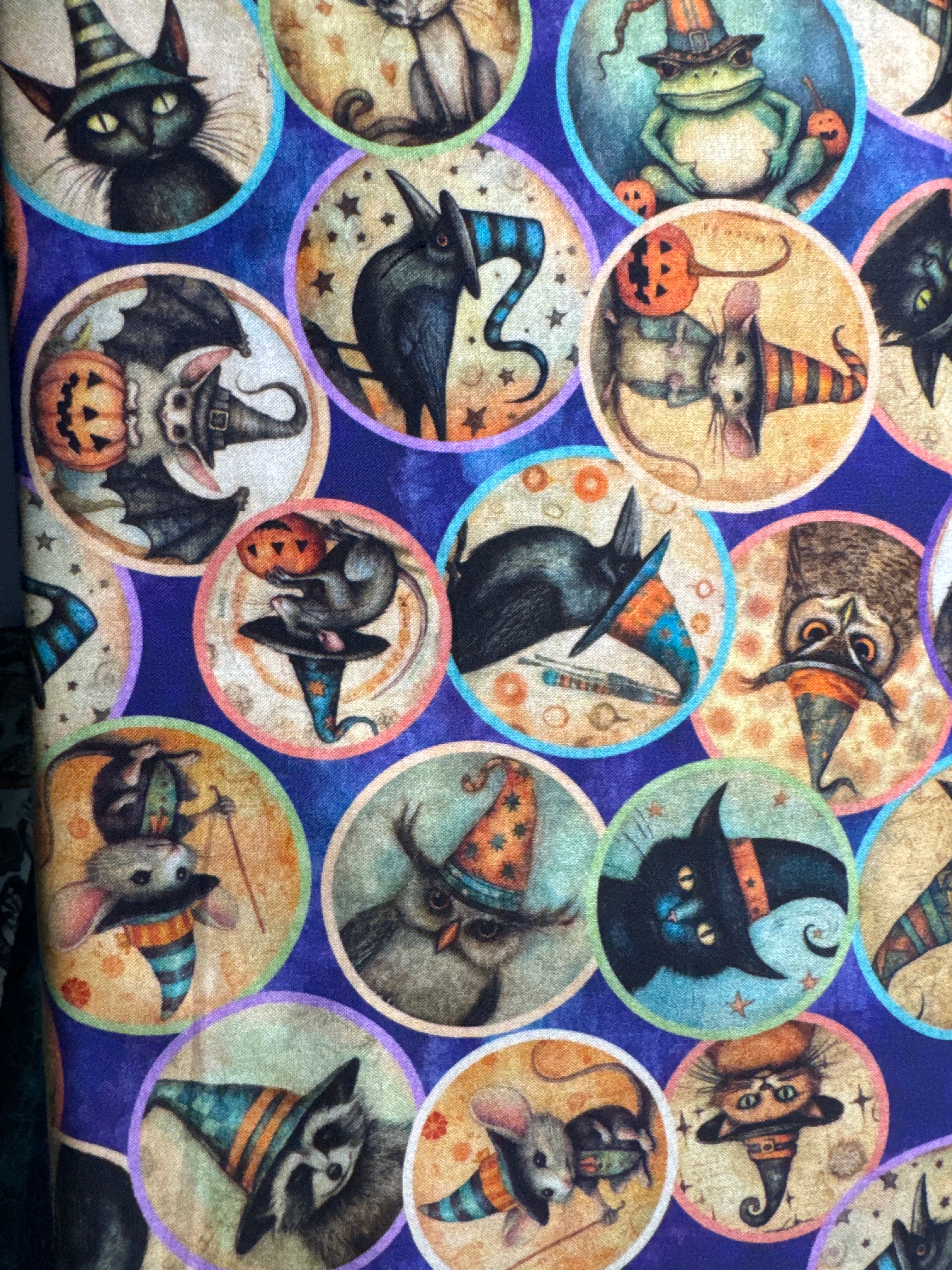 Withcypoo, purple background, animals in hats, sold by the half yard