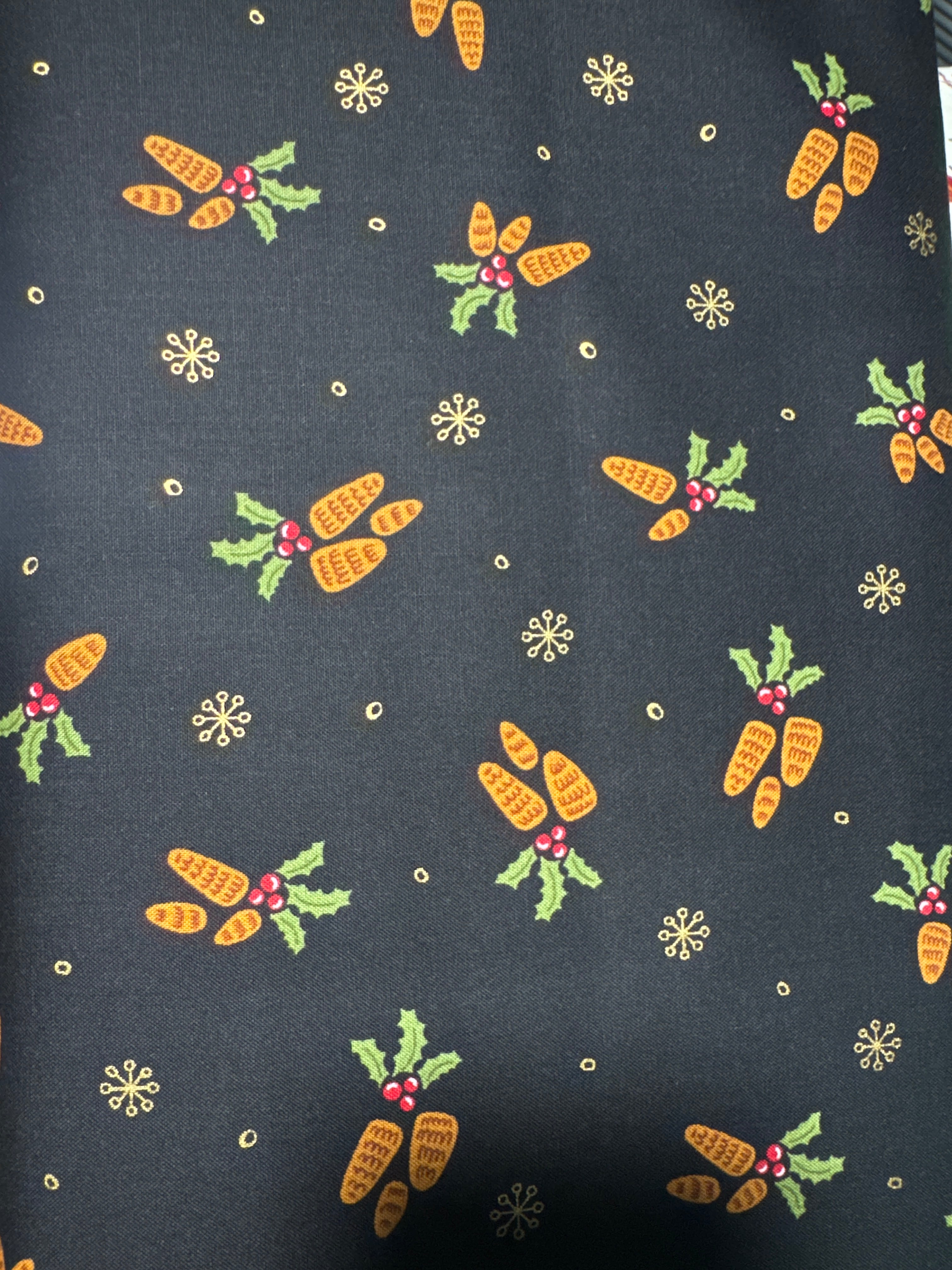 Bird Humbug. Holly and pinecones on Black. Sold by the half yard.