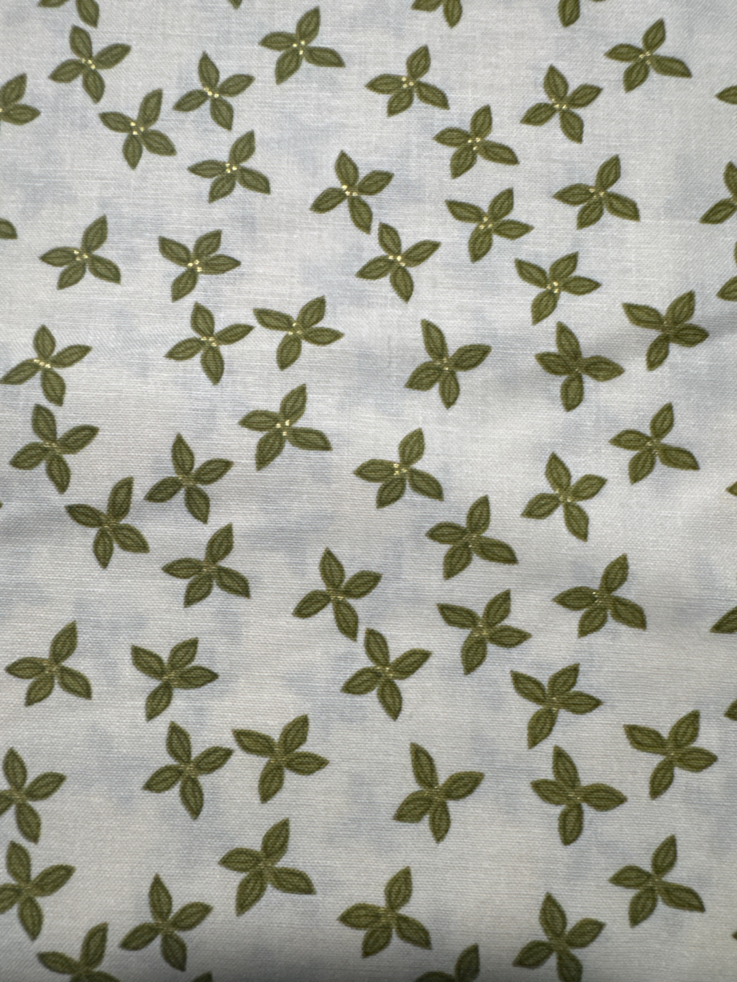 Bird Humbug. Green Poinsettias. Sold by the half yard.