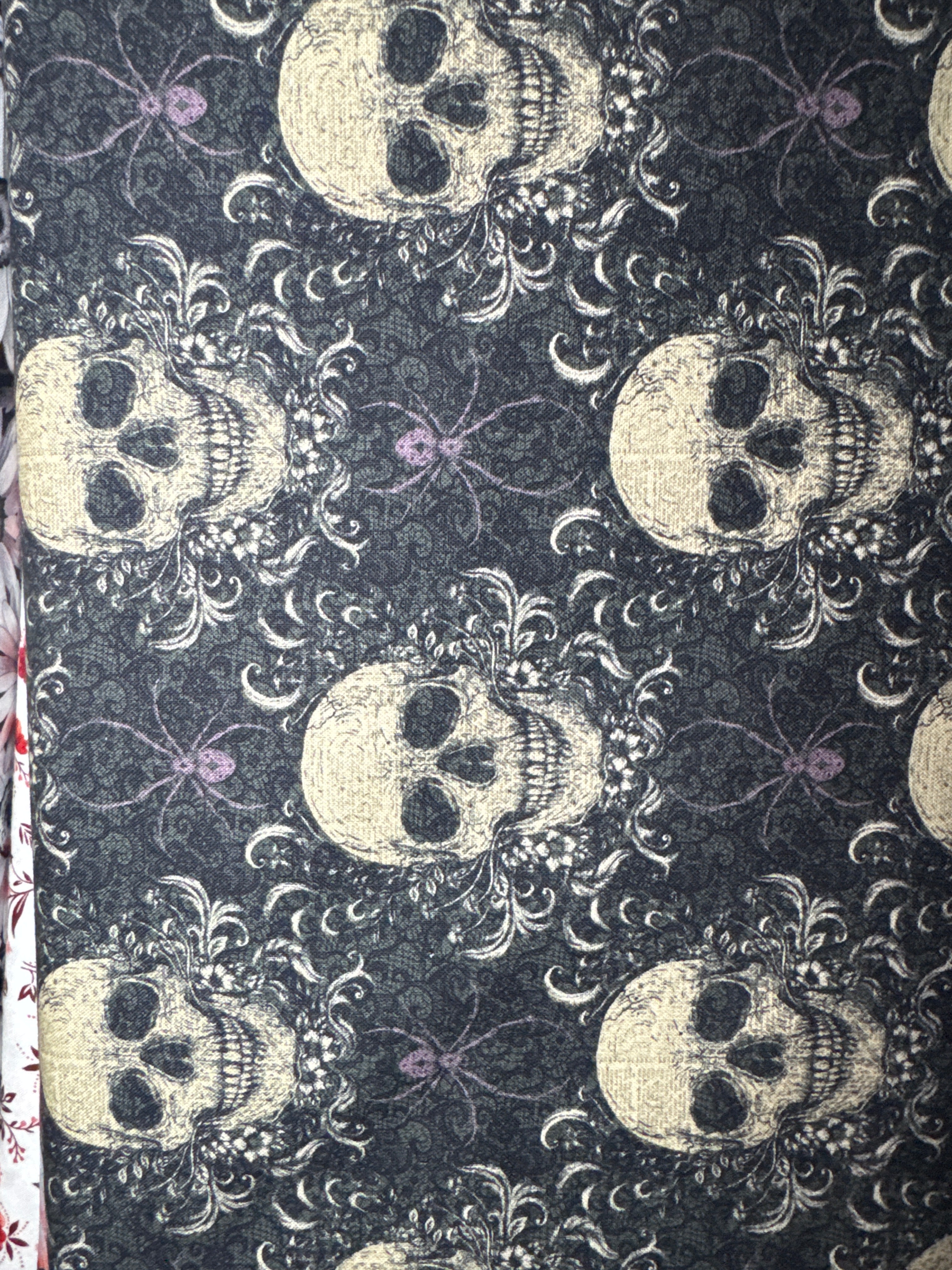 Darkly Enchanted Skulls, sold by the half yard