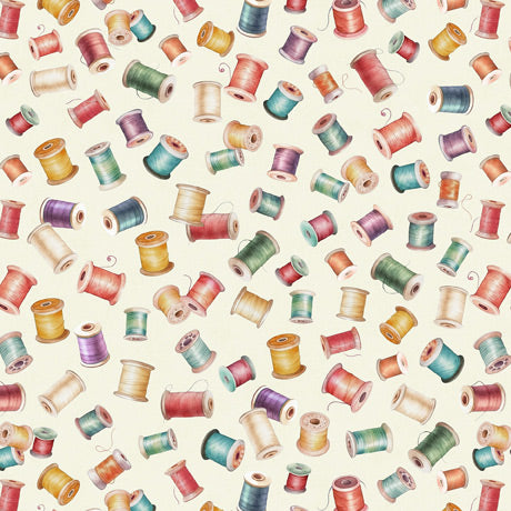 In Stitches. Bobbins. Cream. QT Fabrics. Sold by the yard.