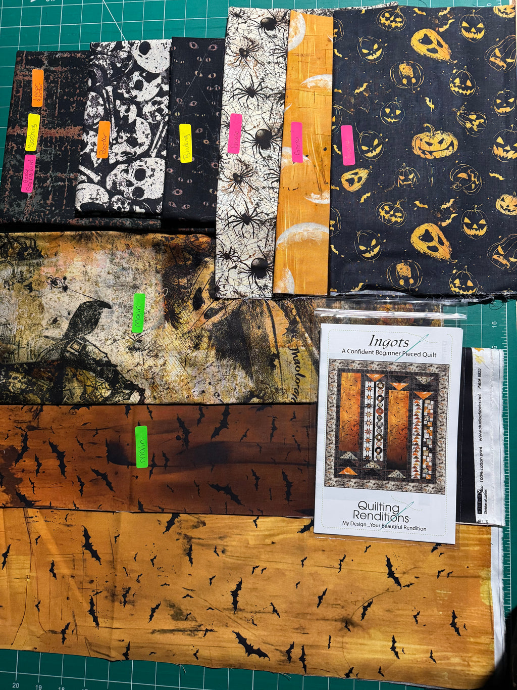 1. Ingots quilt kit stressed black sashing Scary Spice.
