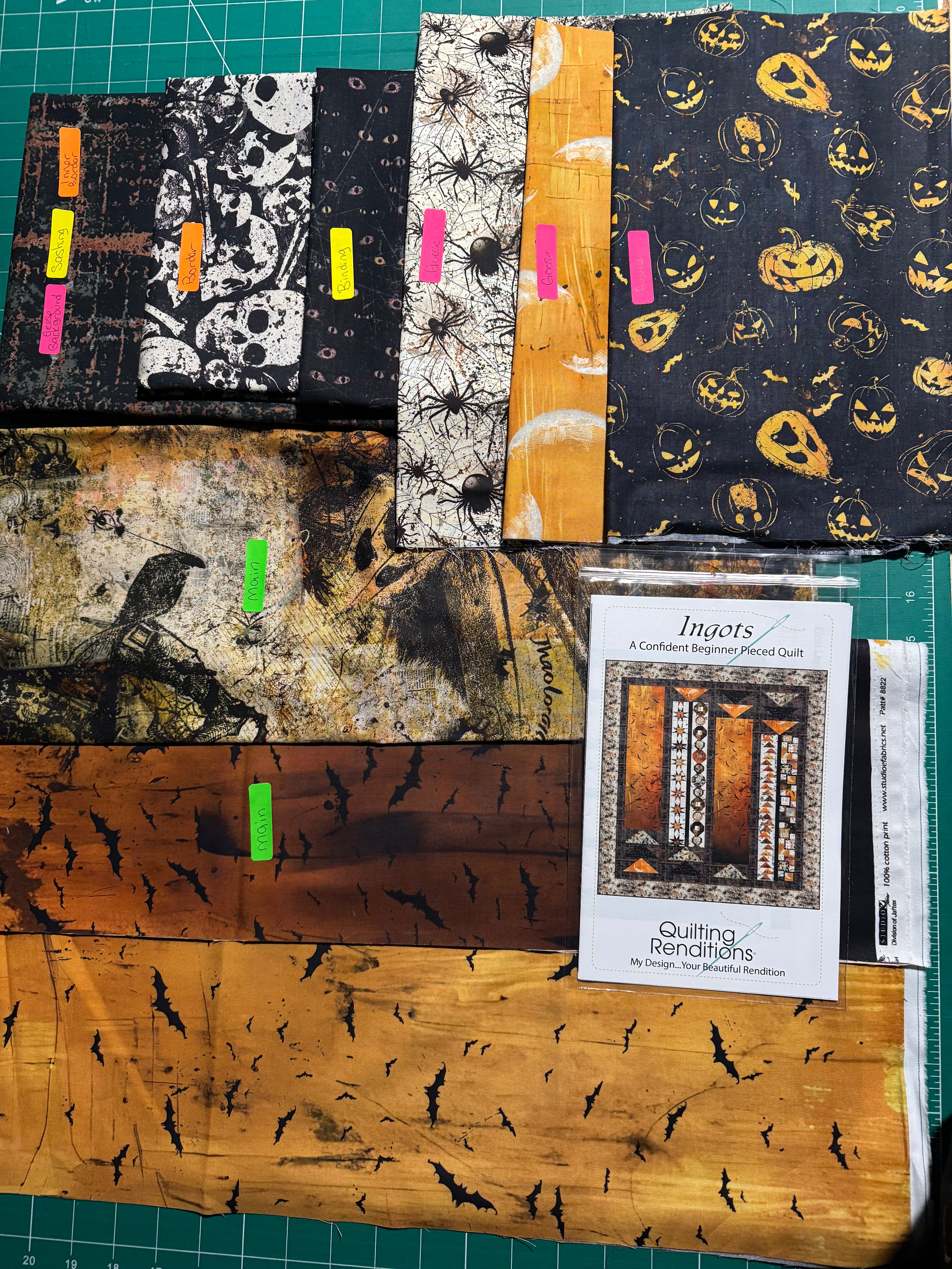 1. Ingots quilt kit stressed black sashing Scary Spice.