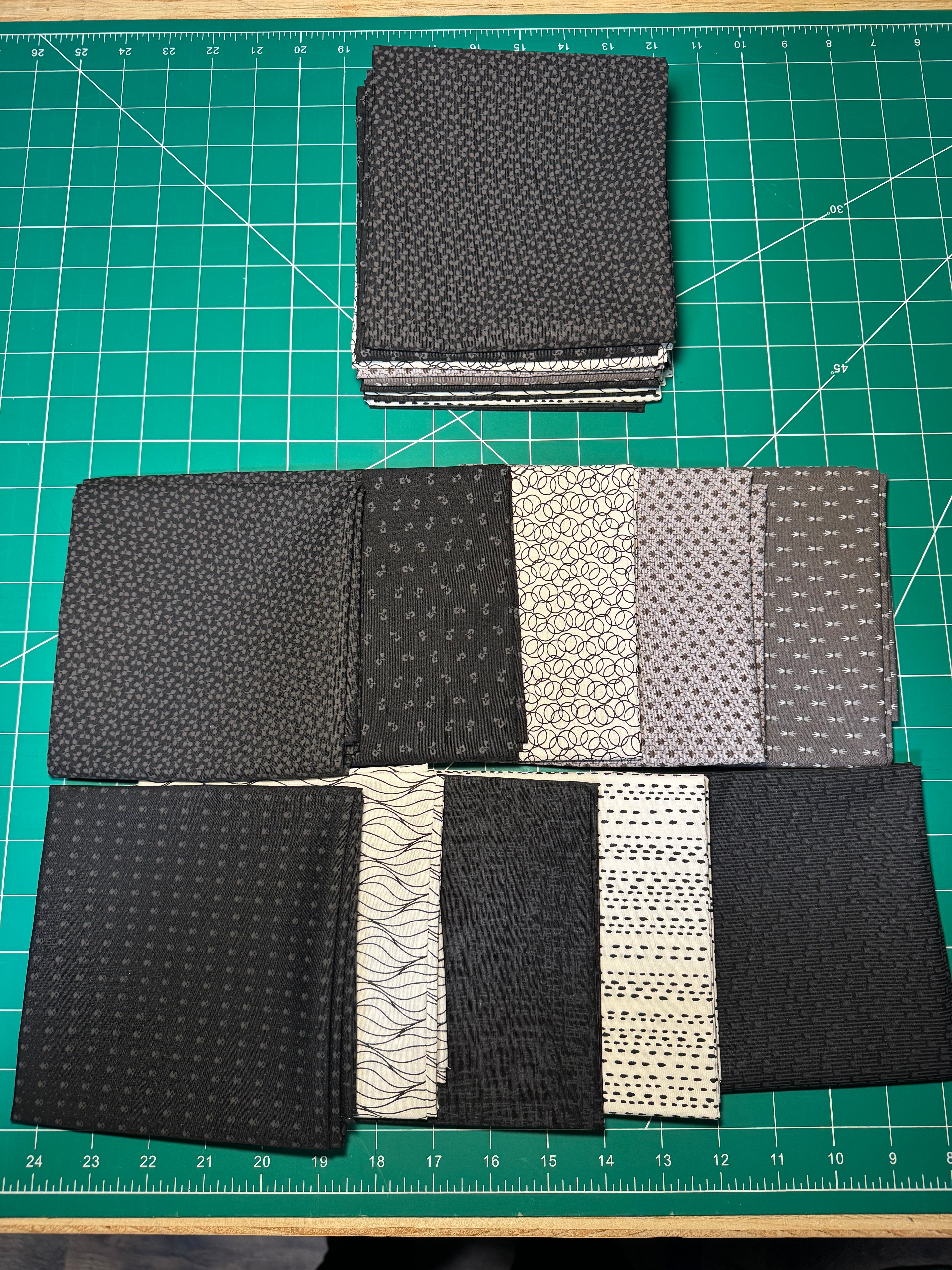 10 Fat Quarters of Century by Andover. Sold as a bundle.