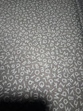 Quilting Illusions. Letters. Black on black. Sold by the HALF  yard QT Fabrics