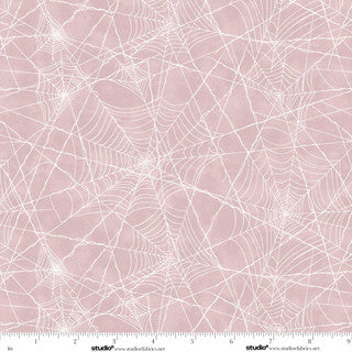 Pretty Scary. Pink Spider webs. Sold by the half yard.